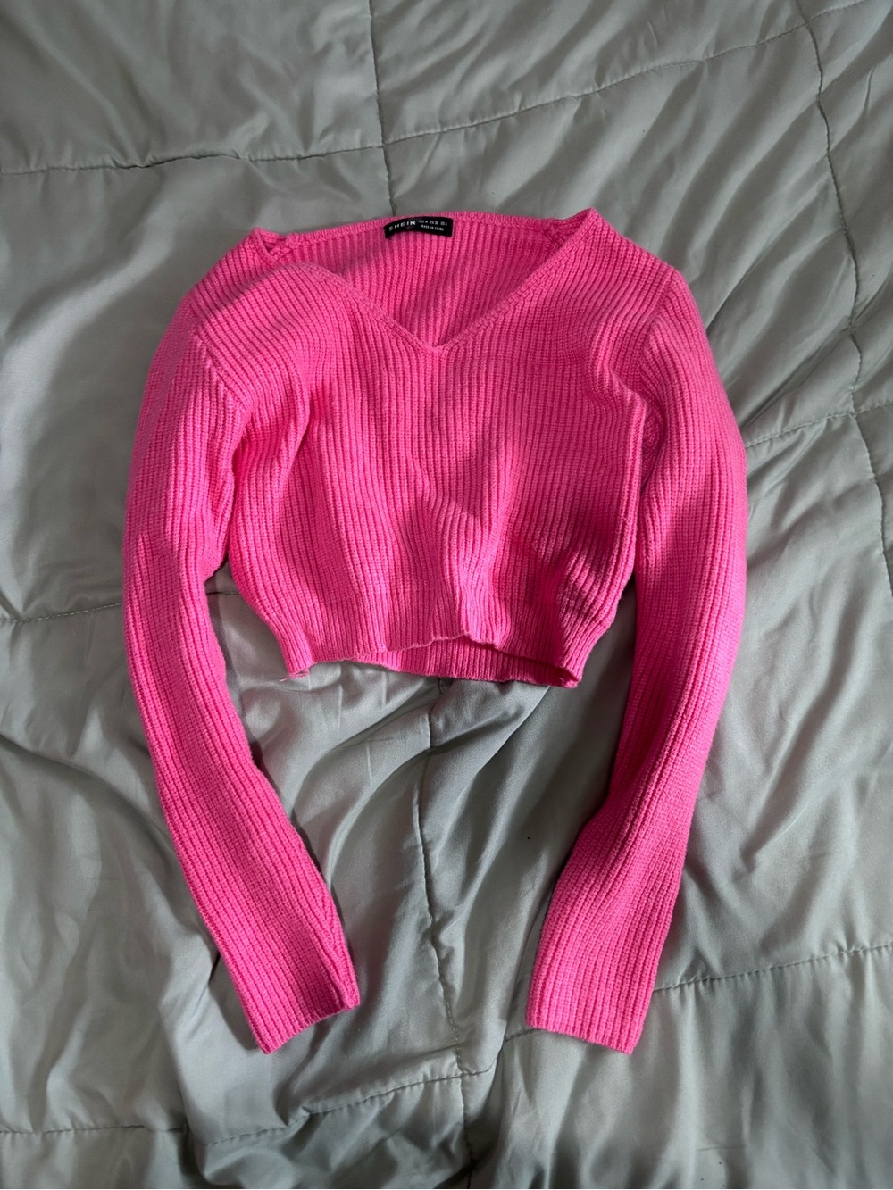 Bright Pink Ribbed V‑Neck Cropped Sweater